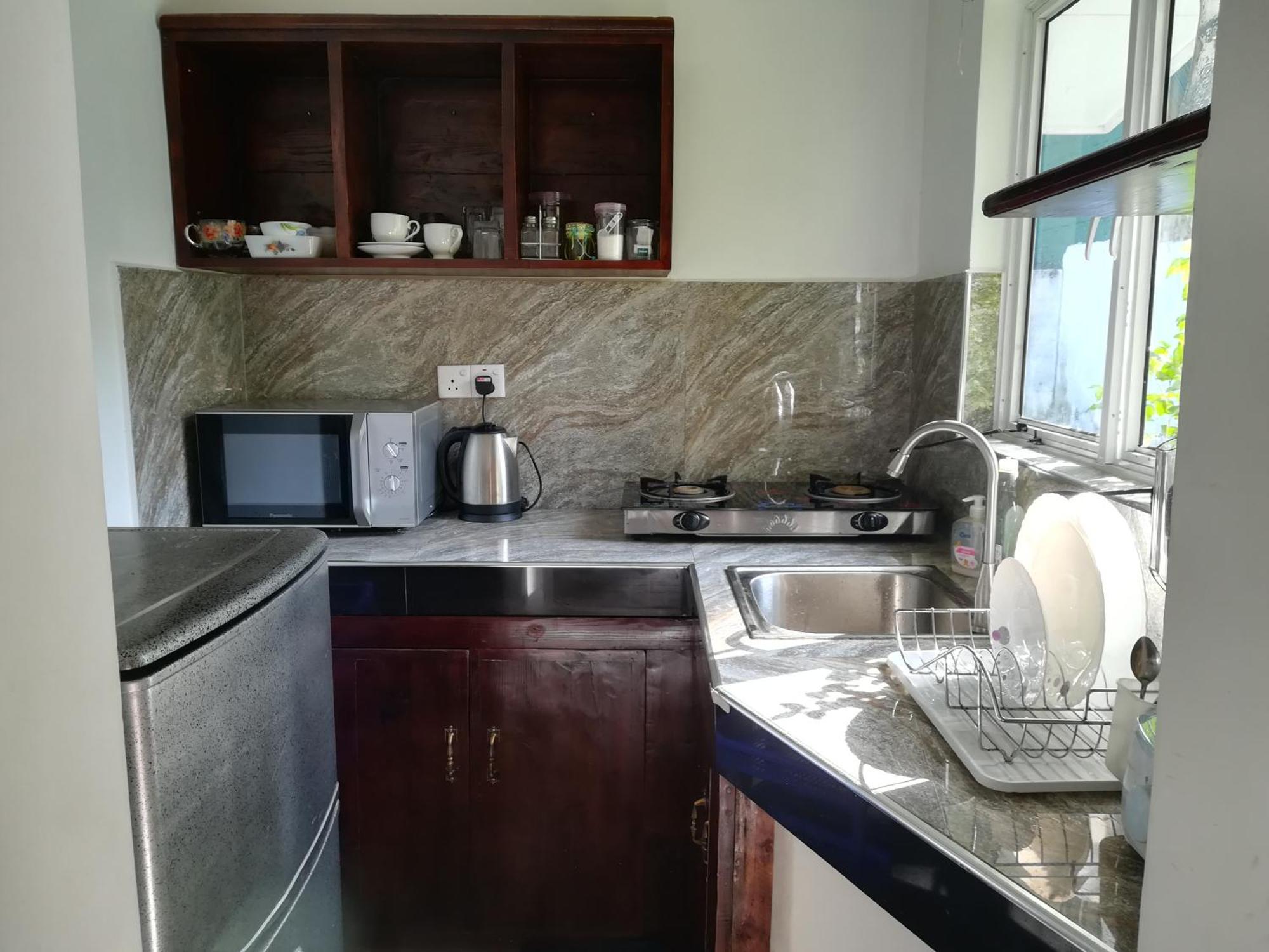 Living Home Negombo Quarto foto