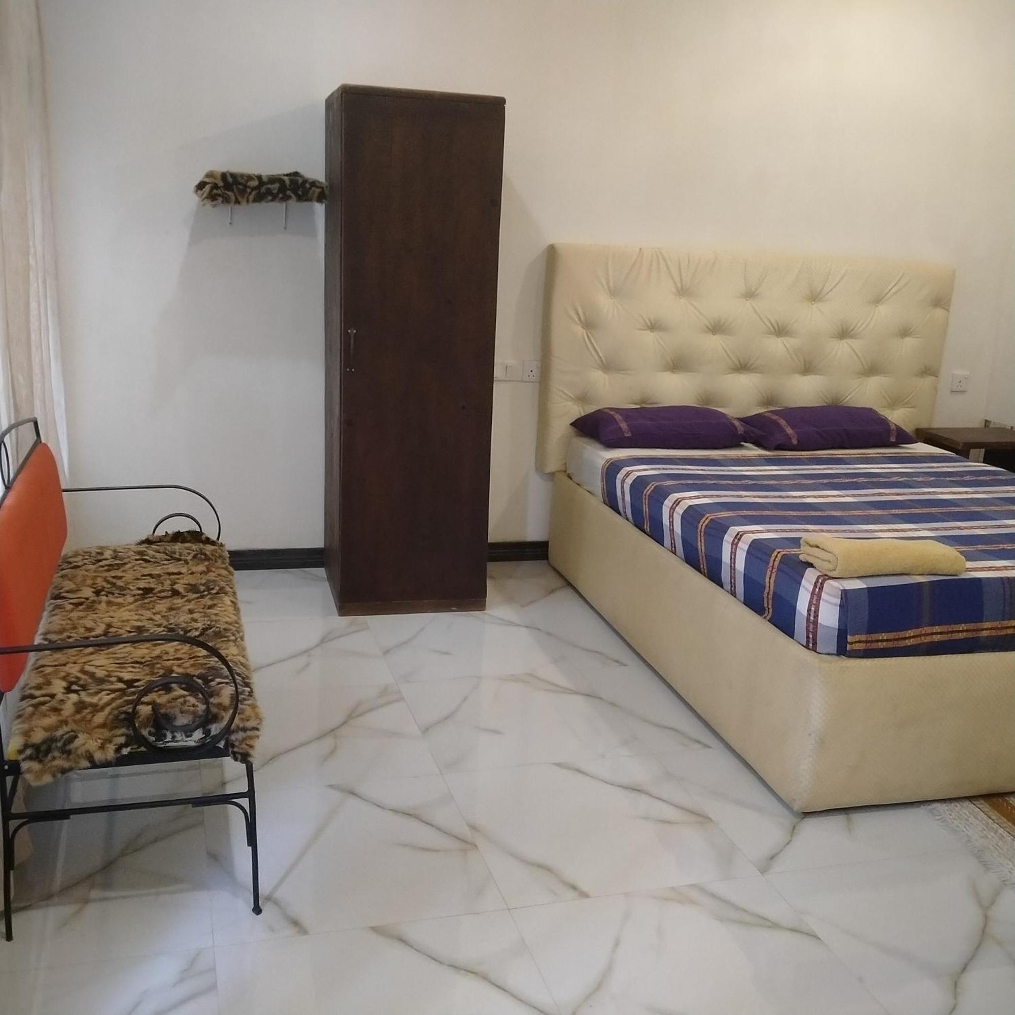 Living Home Negombo Quarto foto