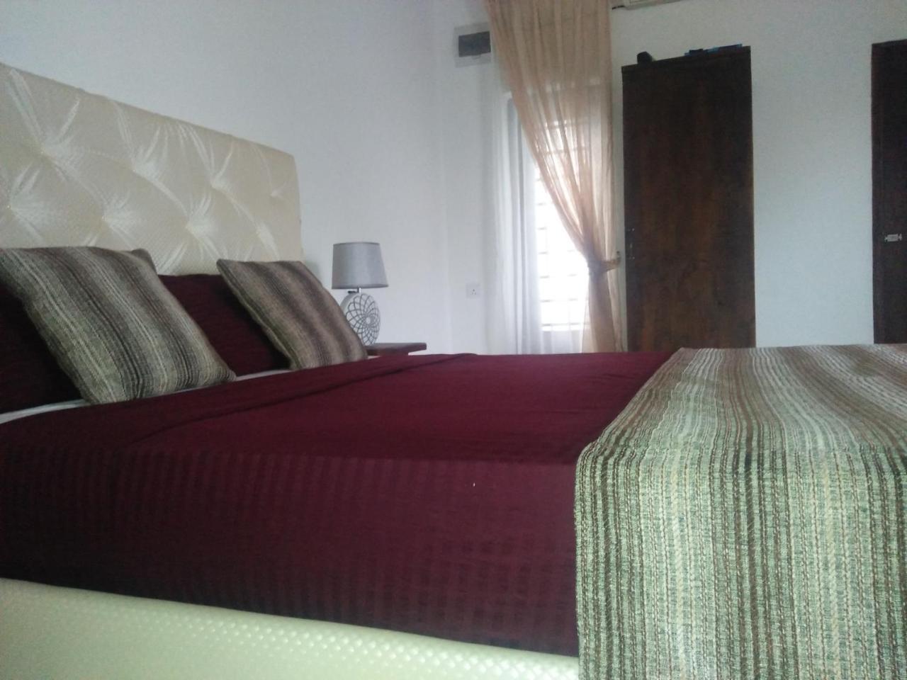 Living Home Negombo Quarto foto